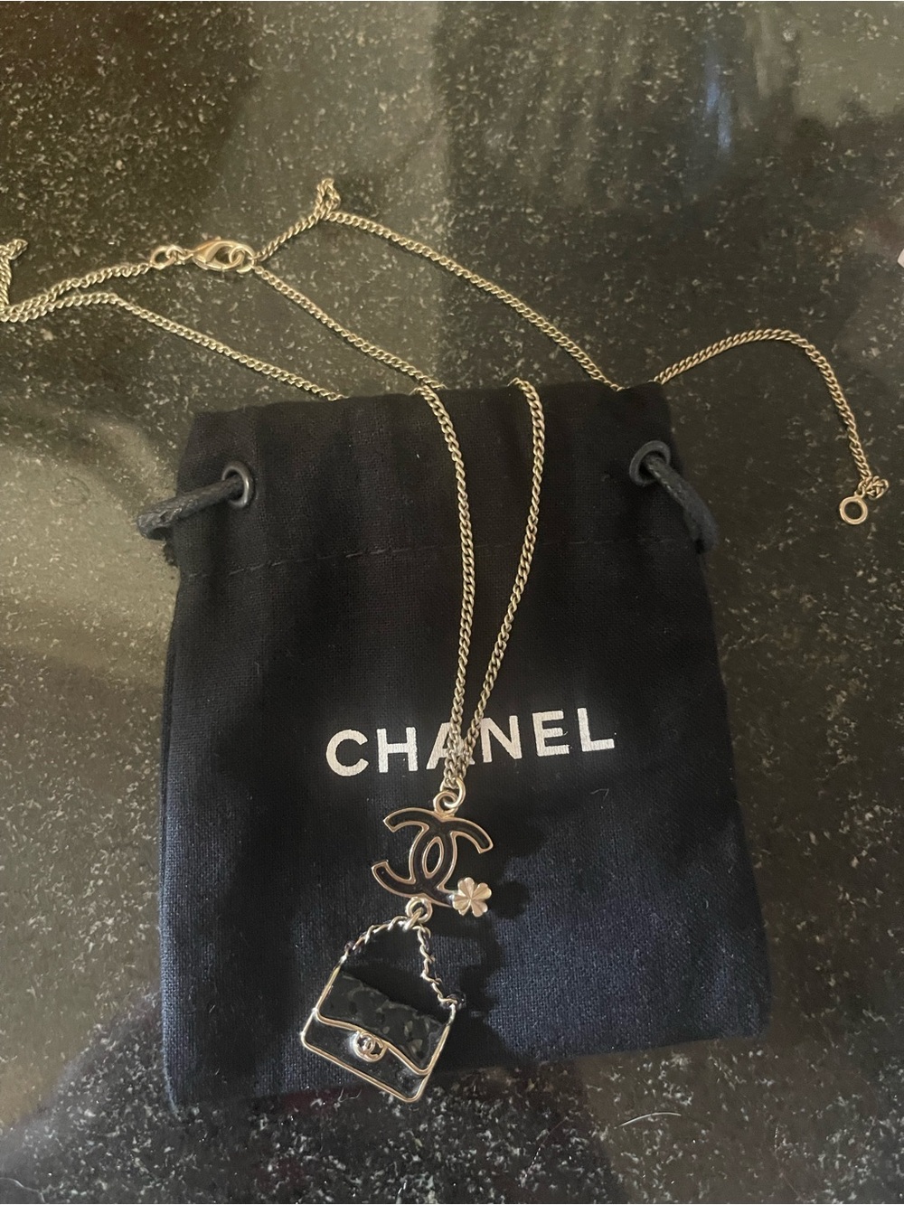 CHANEL Silver CC Logo with Mini Bag and Flower Charm Necklace